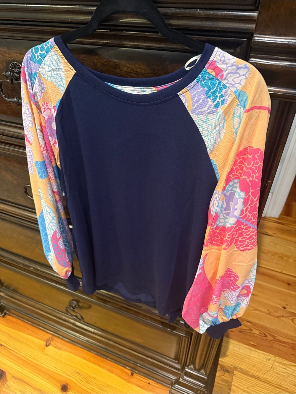 Umgee Navy Top with Multicolor Floral Raglan Sleeves